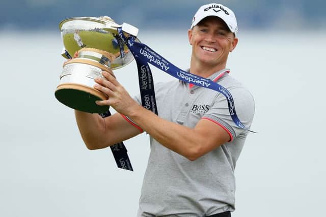 Alex Noren of Sweden poses with the trophy after his victory in last year's AAM Scottish Open at Castle Stuart. Picture: Andrew Redington/Getty Images