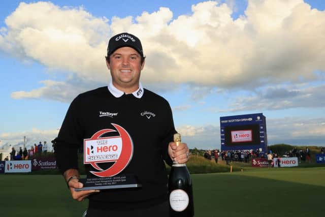 Patrick Reed of the US poses with the trophy after winning the Hero Challenge ahead of the AAM Scottish Open at Dundonald Links. Picture: Andrew Redington/Getty Images