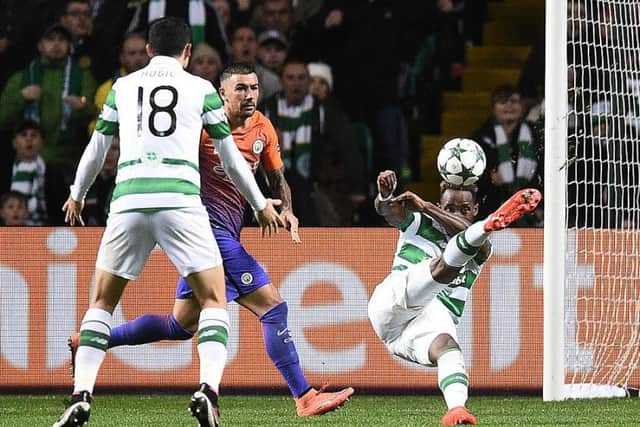 Moussa Dembele nets a spectaculr overhead kick against Manchester City. Picture: OLI SCARFF/AFP/Getty Images