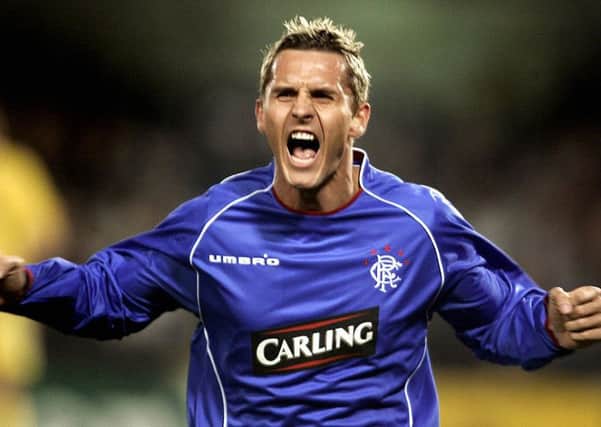 Peter Lovenkrands has returned to Rangers as a coach. Picture: JOSE JORDAN/AFP/Getty Images