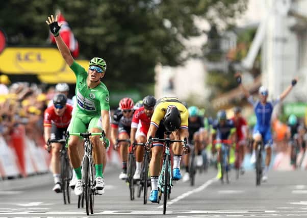 Marcel Kittel of Germany and Quick-Step Floors celebrates his fifth win on stage eleven.  Picture: Bryn Lennon/Getty Images