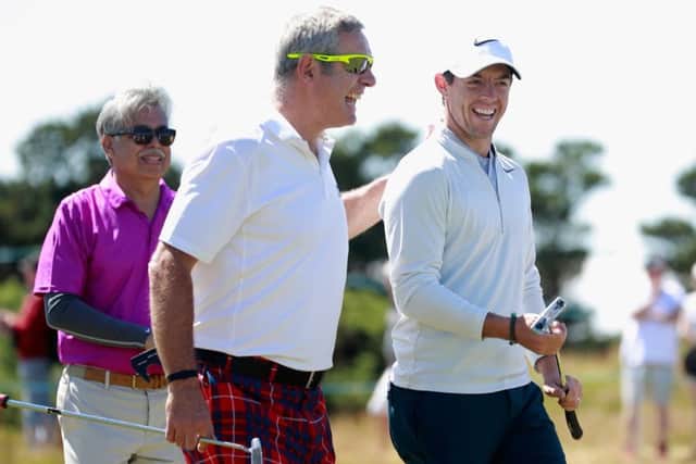 Rory McIlroy shares a joke with Gavin Hastings during the pro-am ahead of the AAM Scottish Open at Dundonald Links. Picture: Gregory Shamus/Getty Images