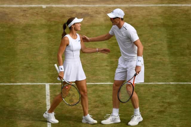 Jamie Murray of Great Britain and Martina Hingis celebrate victory against Ken Skupski and Jocelyn Rae. Picture: Getty.