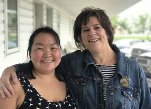 Emma Grey with one of her relatives, Sandi Bezanson-Chan.