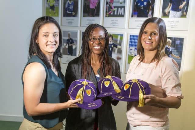 Gemma Fay, Ifeoma Dieke and Julie Fleeting during the opening of a new Scottish FA Women's International Roll of Honour display at Hampden. Picture: Jeff Holmes/PA Wire