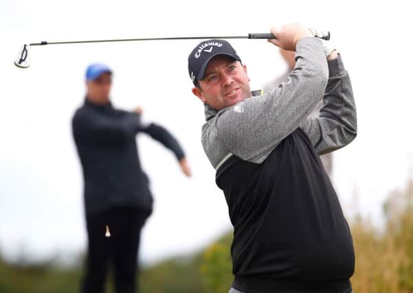 Duncan Stewart tees off during day two of the AAM Scottish Open. Picture: Gregory Shamus/Getty Images
