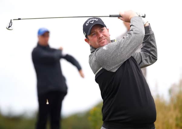 Duncan Stewart tees off  during day two of the AAM Scottish Open. Picture: Gregory Shamus/Getty Images