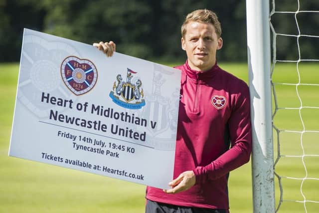 Hearts captain Christophe Berra promotes a friendly match against Newcastle United. Picture: SNS