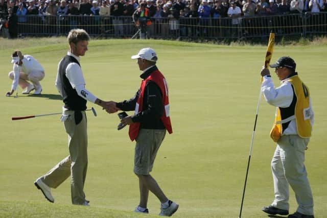 Chris Wood is congratulated by his caddie after completing the fourth round at Royal Birkdale as leading amateur in 2008. Photograph: Glyn Kirk/Getty Images