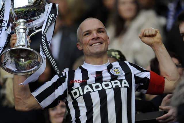 Jim Goodwin lifts the League Cup for St Mirren in 2013. Picture: Phil Wilkinson