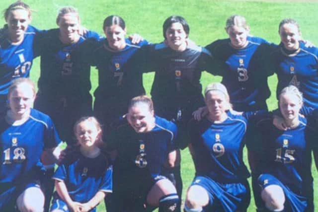 Erin Cuthbert, front row second left, in the Scotland team line-up as a mascot.
