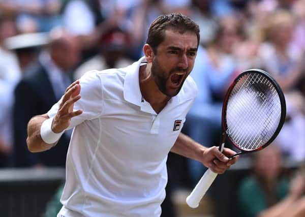 Croatia's Marin Cilic celebrates his win over Sam Querrey in the men's singles semi-final. Picture: Glyn Kirk/AFP/Getty Images