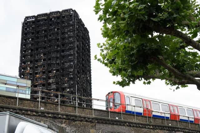 A month after a massive fire claimed the lives of at least 80 people, investigations continue at Grenfell Tower in north London. Picture: Leon Neal/Getty Images