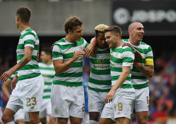 Celtic players celebrate after Scott Sinclair opens the scoring. Picture: Getty