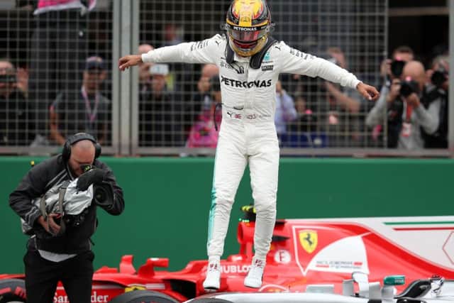 Lewis Hamilton is clearly delighted after leaving the field trailing in final qualifying. Photograph: David Davies/PA