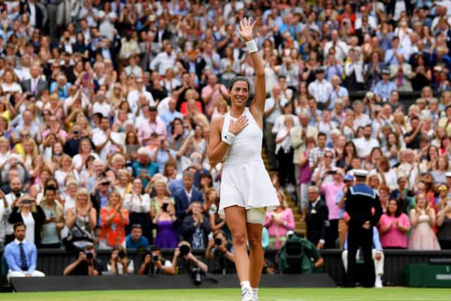 Garbine Muguruza of Spain celebrates victory after the Ladies Singles final against Venus Williams. Picture: Shaun Botterill/Getty Images