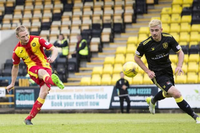 Thistle's Chris Erskine fires home the opener for the away side. Picture: SNS/Bruce White
