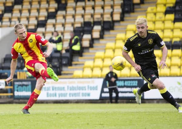 Thistle's Chris Erskine fires home the opener for the away side. Picture: SNS/Bruce White