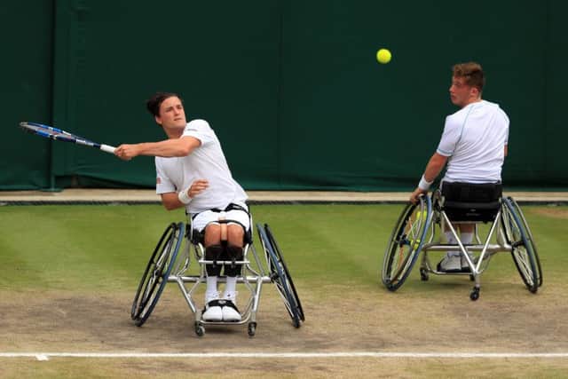 Gordon Reid in action alongside partner Alfie Hewett (right) in the Gentleman's Wheelchair Doubles final at Wimbledon. Picture: Adam Davy/PA Wire