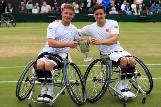 Alfie Hewett (left) and Gordon Reid celebrate beating Stephane Houdet and Nicolas Peifer in themen's wheelchair doubles final at Wimbledon. Picture: Adam Davy/PA Wire