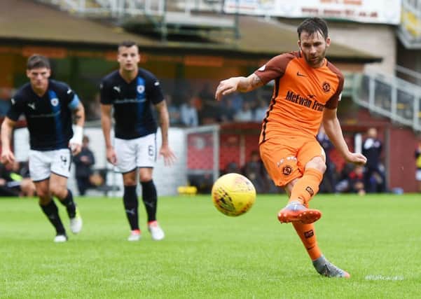 James Keatings sweeps home the 72nd-minute penalty for Dundee United after substitute Sam Stanton had been brought down.  Photograph: Sammy Turner/SNS