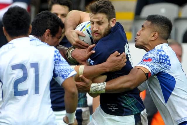 Scotland and Samoa fought out a thrilling pool match in Newcastle at the 2015 World Cup. Picture: Jane Barlow.