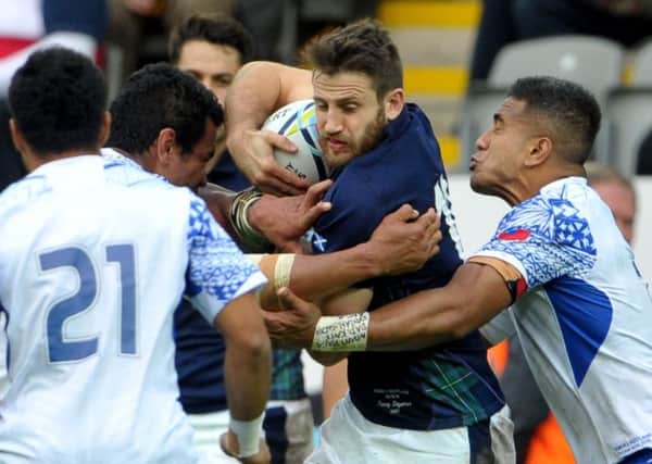 Scotland and Samoa fought out a thrilling pool match in Newcastle at the 2015 World Cup. Picture: Jane Barlow.