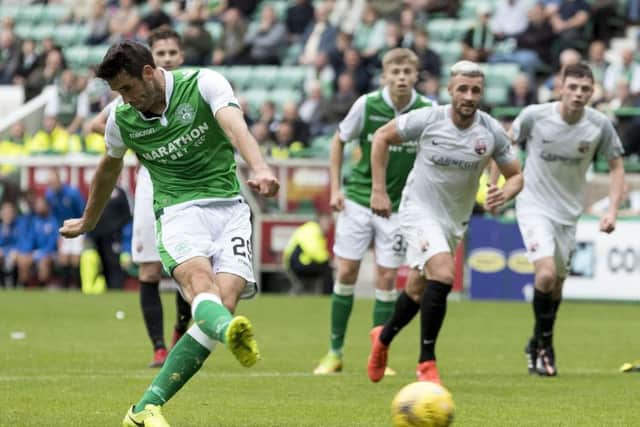 Brian Graham converts a penalty to make it 4-0 for Hibs. Picture: SNS.
