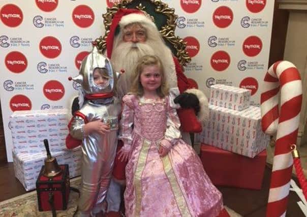 Agatha with Santa at the winter wonderland. Picture: Contributed