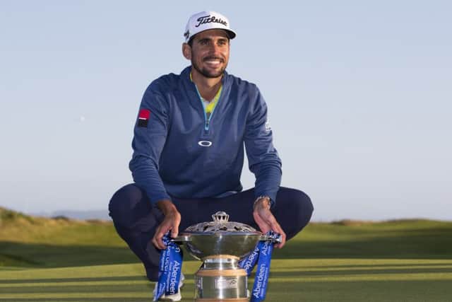 Rafa Cabrera Bello celebrates after winning the Aberdeen Asset Management Scottish Open. Picture: SNS/Kenny Smith