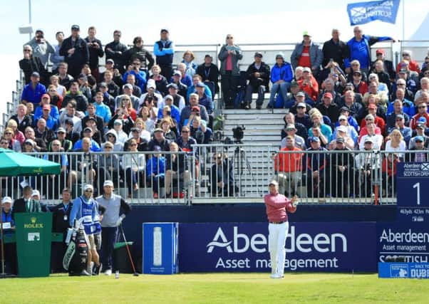 Ian Poulter of England tees off in front of crowds at Dundonald Links Golf Course. Picture: Andrew Redington/Getty Images