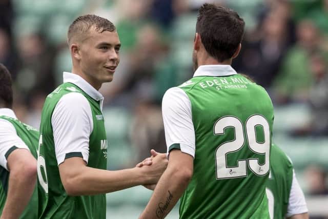 Ryan Porteous, left, and Brian Graham celebrate at the final whistle. Picture: SNS Group