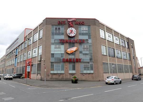 The Tunnock's factory in Uddingston. The Lion Rampant logo can be seen at the top of the building's frontage. Picture: Alan Watson
