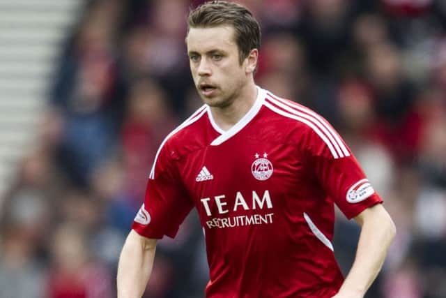 Kari Arnason has re-signed for Aberdeen five years after leaving the club. Picture: SNS