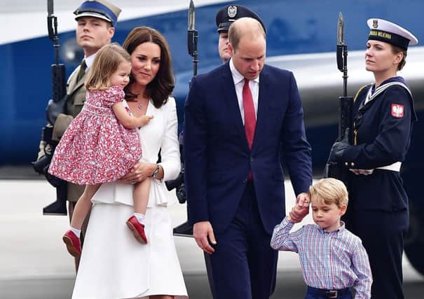 The Duke and Duchess of Cambridge arrive at Warsaw's Chopin Airport with Prince George and Princess Charlotte. Picture: Dominic Lipinski/PA Wire