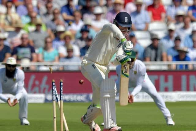 Englands Keaton Jennings is bowled for just three runs by South African seamer Vernon Philander. Picture: Anthony Devlin/AFP/Getty