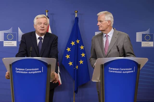 EU chief Brexit negotiator Michel Barnier and David Davis. Picture: AP/Geert Vanden Wijngaert
