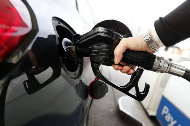Lower prices at the pumps saw inflation ease last month. Picture: Lynne Cameron/PA Wire