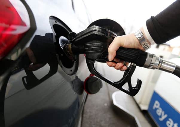 Lower prices at the pumps saw inflation ease last month. Picture: Lynne Cameron/PA Wire