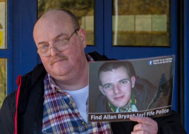 Allan Bryant senior with a picture of his son, Allan junior, who was last seen outside a Glenrothes nightclub in 2013. Picture: Steven Brown