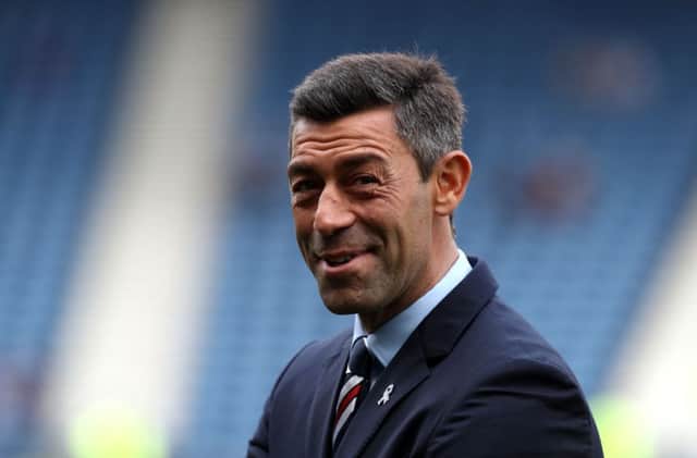 Fans are set to travel in their thousands to watch Pedro Caixinha's side. Picture: PA