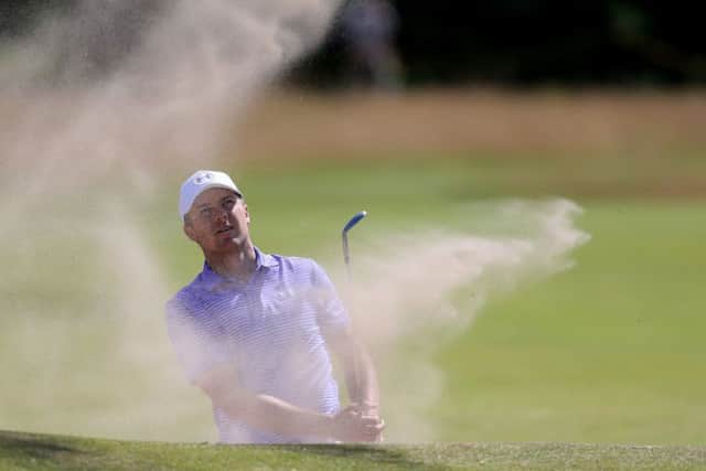 Jordan Spieth chips out of a bunker during practice  at Royal Birkdale.