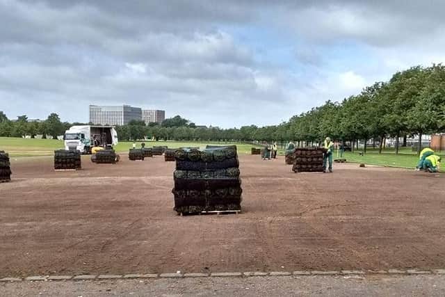 Repairs to grass on Glasgow Green today. Picture: Mairi Carrey