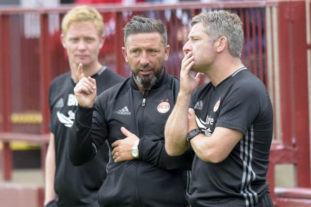 Derek McInnes and Tony Dochertys long term partnership will continue for another two years.