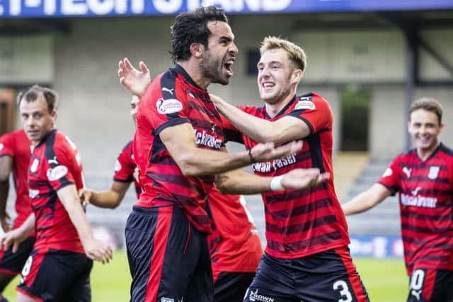 Dundees Tunisian striker Sofien Moussa celebrates his opener against Raith Rovers at Starks Park.