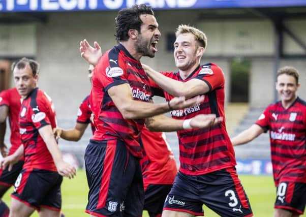 Dundees Tunisian striker Sofien Moussa celebrates his opener against Raith Rovers at Starks Park.