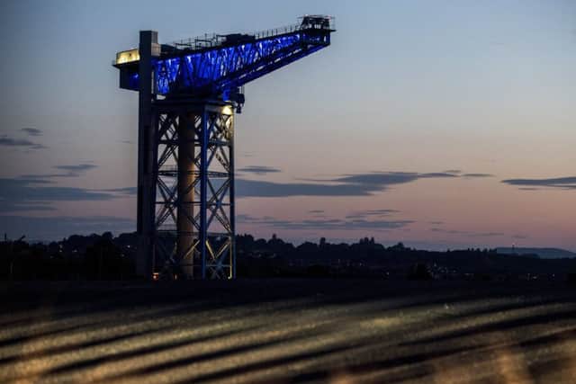 The Titan Crane lit up in blue in support of the Scotland Women's National Team. Picture: SNS Group