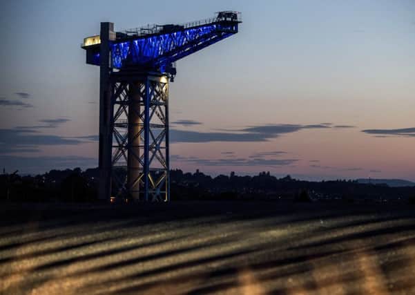 The Titan Crane lit up in blue in support of the Scotland Women's National Team. Picture: SNS Group
