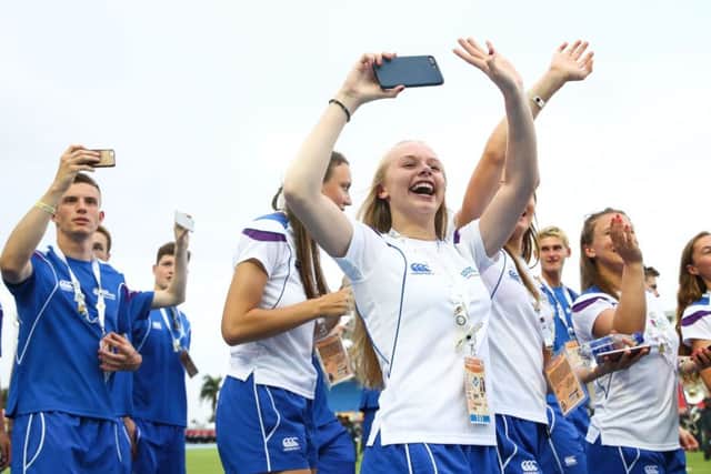 Scottish athletes walk out on to the track at the opening ceremony. Picture: Getty.