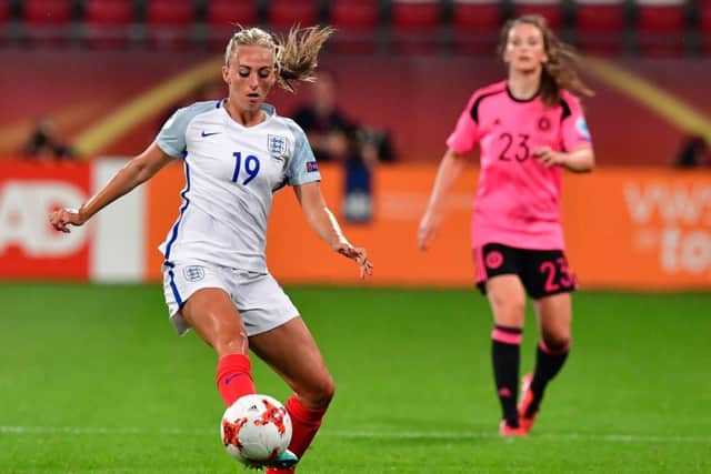 England forward Toni Duggan controls the ball ahead of Scotland's Chloe Arthur. Picture: AFP/Getty Images